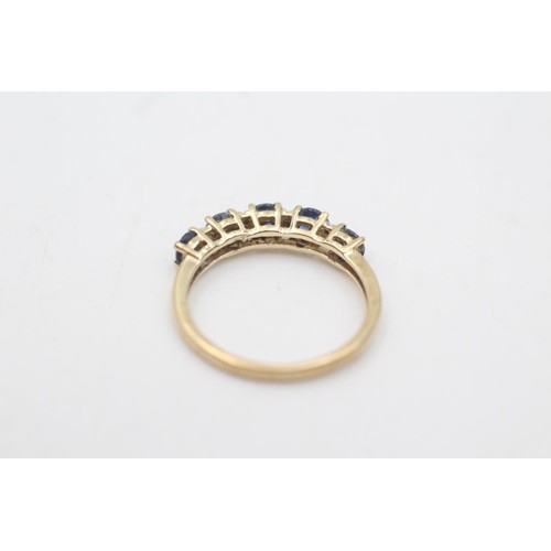 2077 - A 9ct gold sapphire and diamond five stone dress ring, size M½ - approx. gross weight 1.6 grams