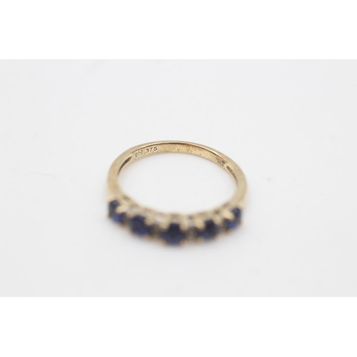 2077 - A 9ct gold sapphire and diamond five stone dress ring, size M½ - approx. gross weight 1.6 grams