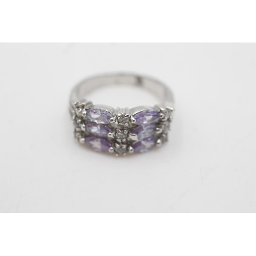 2078 - A 14ct white gold purple and clear gemstone cluster dress ring, N½ - approx. gross weight 3.9 grams