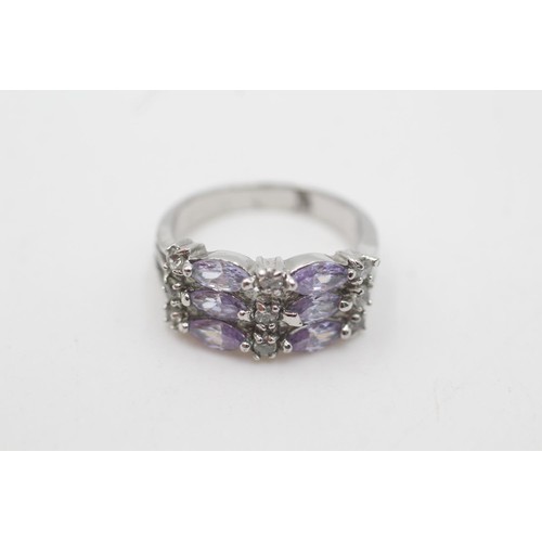 2078 - A 14ct white gold purple and clear gemstone cluster dress ring, N½ - approx. gross weight 3.9 grams