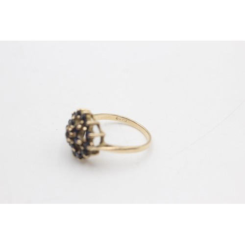 2082 - A 9ct gold sapphire cluster ring, size N½ - approx. gross weight 3 grams