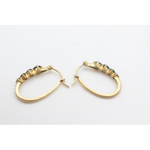 2086 - A pair of 9ct gold topaz hoop earrings - approx. gross weight 2.6 grams