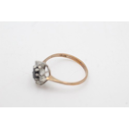 2089 - A hallmarked London 9ct gold sapphire and clear gemstone floral halo set ring, size O½ - approx. gro... 