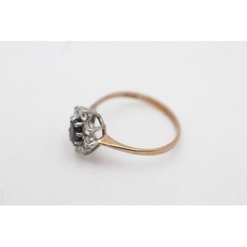 2089 - A hallmarked London 9ct gold sapphire and clear gemstone floral halo set ring, size O½ - approx. gro... 