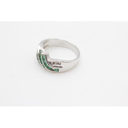 2091 - A 9ct white gold emerald and diamond channel setting crossover ring, size O - approx. gross weight 2... 