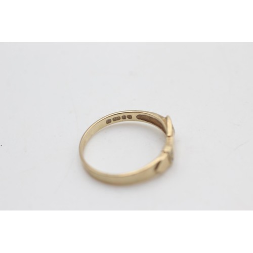 2092 - A hallmarked London 9ct gold diamond detail belt buckle band ring, size K ½ - approx. gross weight 1... 