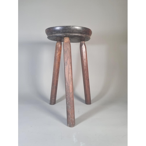 278 - A vintage carved oak tripod stool with floral design - approx. 38cm high x 22cm diameter