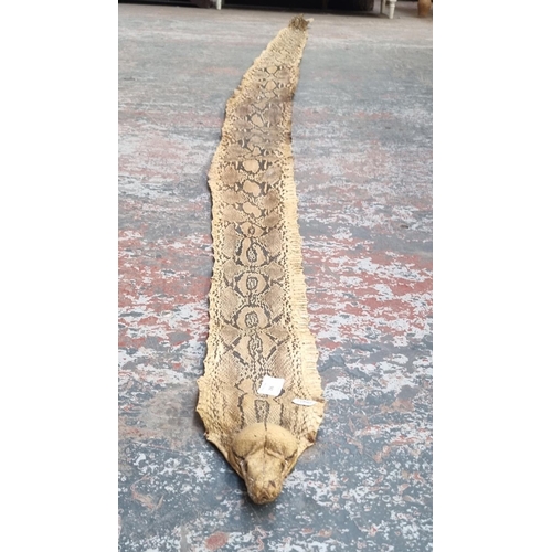 296 - A vintage snakeskin - approx. 388cm long