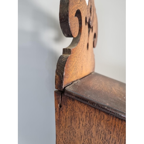 305 - A 19th century oak candle box - approx. 60cm high x 20cm wide x 15cm deep