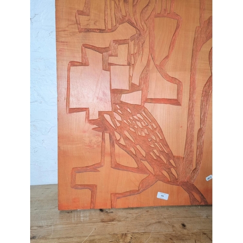 306 - A 20th century orange painted carved wooden wall hanging - approx. 82cm high x 20cm wide x3.5cm deep