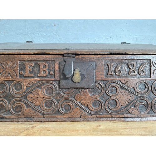 403 - A 17th century and later carved oak bible box - approx. 29.5cm high x 70cm wide x 41cm deep