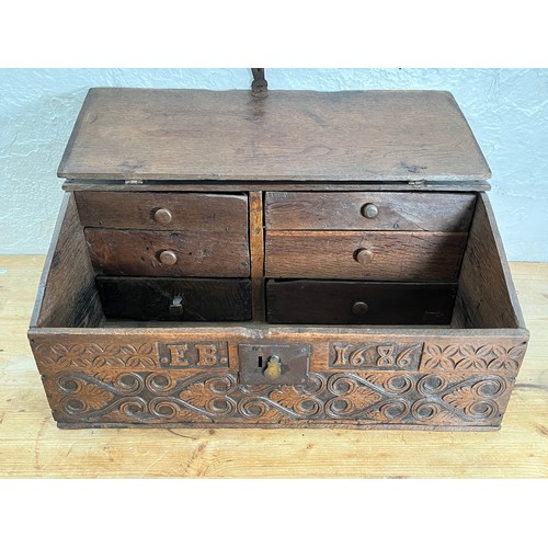 403 - A 17th century and later carved oak bible box - approx. 29.5cm high x 70cm wide x 41cm deep