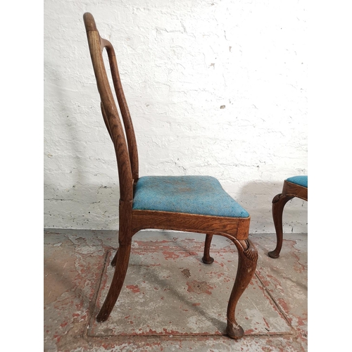 312 - A set of four mid 20th century Queen Anne style oak dining chairs