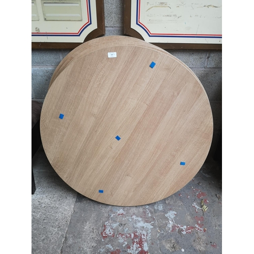 320 - Six modern oak effect circular table tops - approx. 90cm diameter x 5cm wide