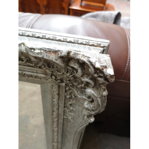 332 - A modern Louis XV style ornate framed bevelled edge wall mirror - approx. 130cm x 104cm