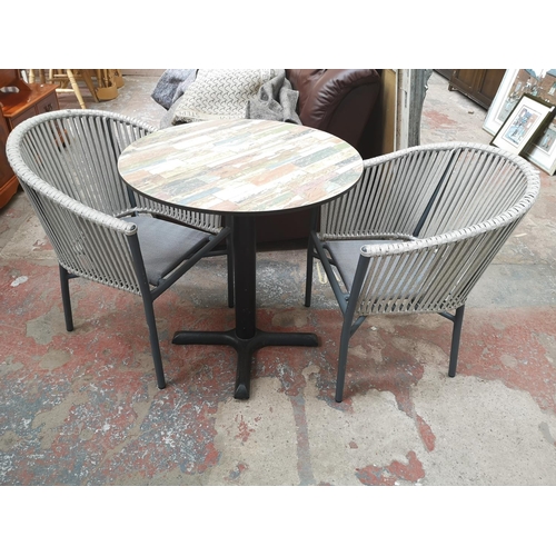 333 - A modern reclaimed wood effect circular bistro table and two grey metal and woven armchairs - approx... 