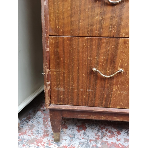 340 - A mid 20th century Gimson & Slater Ltd Vesper Furniture tola wood chest of four drawers - approx. 91... 