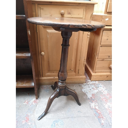 351 - Two pieces of oak furniture, one 19th century tilt top circular tri-pod side table - approx. 69cm hi... 