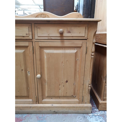 352 - A Victorian style solid pine sideboard with three drawers and three lower cupboard doors - approx. 9... 