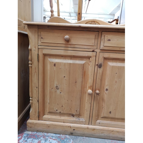 352 - A Victorian style solid pine sideboard with three drawers and three lower cupboard doors - approx. 9... 