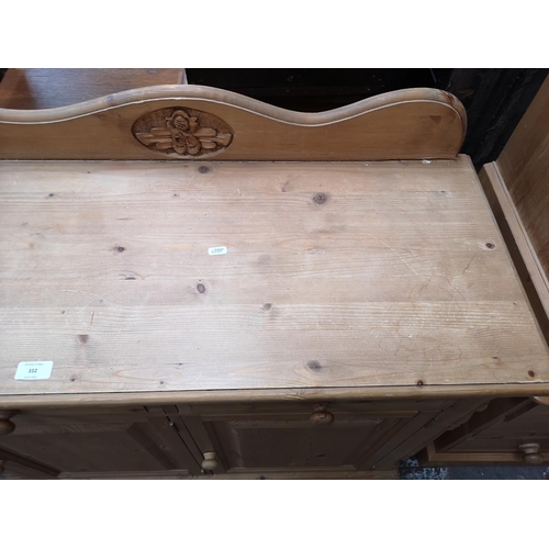 352 - A Victorian style solid pine sideboard with three drawers and three lower cupboard doors - approx. 9... 