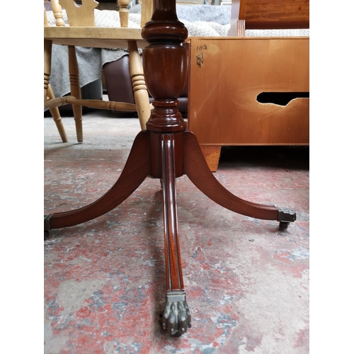 362 - Two occasional tables, one Regency style yew wood effect with brass lion paw feet - approx. 54cm hig... 