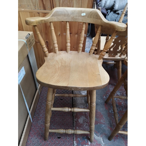 364 - A pair of solid beech spindle back kitchen bar stools