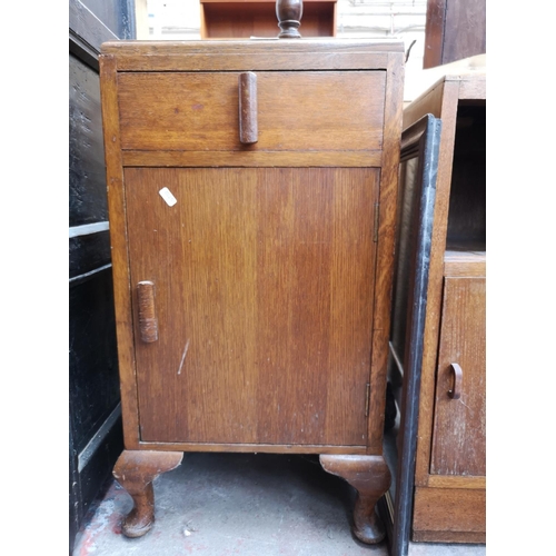 368 - Three pieces of oak furniture, two Art Deco bedside cabinets and one early/mid 20th century wall mir... 