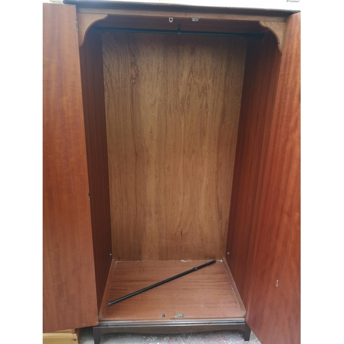 379 - A Stag Minstrel mahogany double wardrobe - approx. 178cm high x 95cm wide x 60cm deep