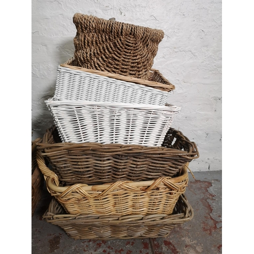 380 - A large collection of various wicker baskets