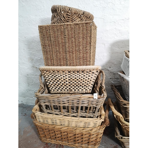 380 - A large collection of various wicker baskets