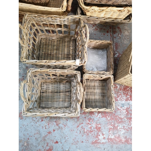 380 - A large collection of various wicker baskets