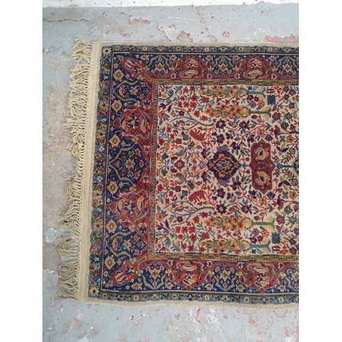 383 - A Woodford Grosvenor Tree of Life rug - approx. 183cm x 91cm