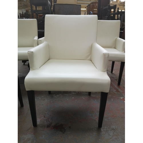 395 - A set of six modern white leatherette dining chairs