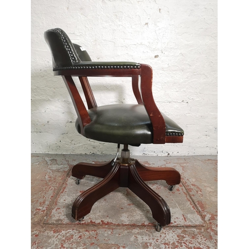 397 - A green leather and mahogany swivel captain's desk chair - approx. 80cm high x 58cm wide x 46cm deep