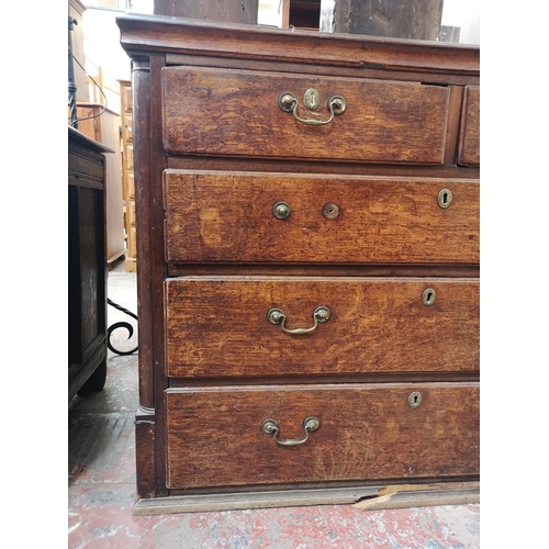 405 - A George III oak chest of two short over three long drawers - approx. 94cm high x 118cm wide x 54cm ... 