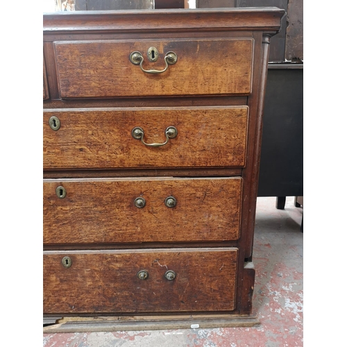 405 - A George III oak chest of two short over three long drawers - approx. 94cm high x 118cm wide x 54cm ... 