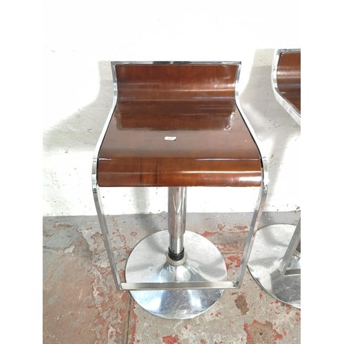 410 - A set of three walnut effect and chrome kitchen bar stools