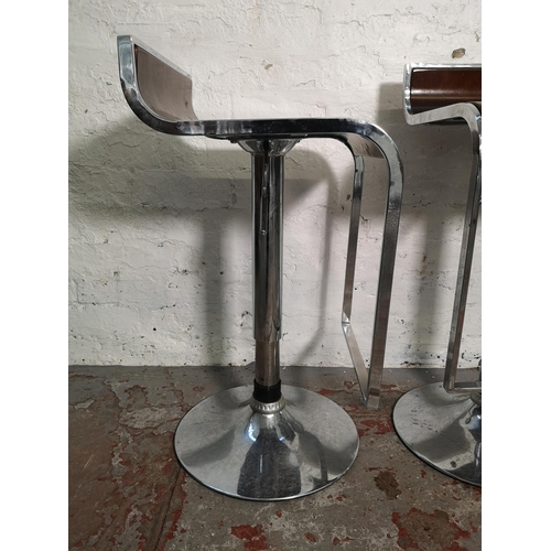 410 - A set of three walnut effect and chrome kitchen bar stools