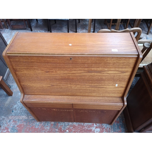 419 - A Remploy teak bureau - approx. 106cm high x 91cm wide x 41cm deep