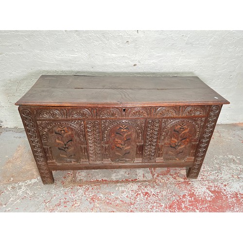 407 - A 17th century and later oak coffer - approx. 80cm high x 142cm wide x 55cm deep