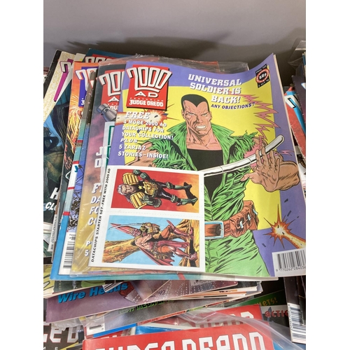 196 - Two boxes containing a large collection of Judge Dredd and 2000 AD comics to include Sci-Fi Special,... 