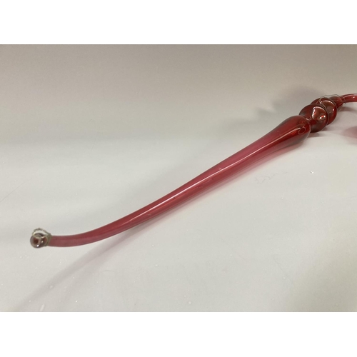 209 - A 19th century Nailsea style cranberry glass pipe - approx. 69cm long