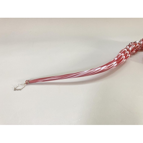 213 - A 19th century Nailsea style cranberry and white swirl glass pipe - approx. 40cm long