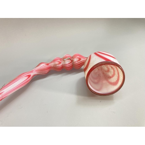 214 - A 19th century Nailsea style white and pink swirl glass pipe - approx. 39cm long