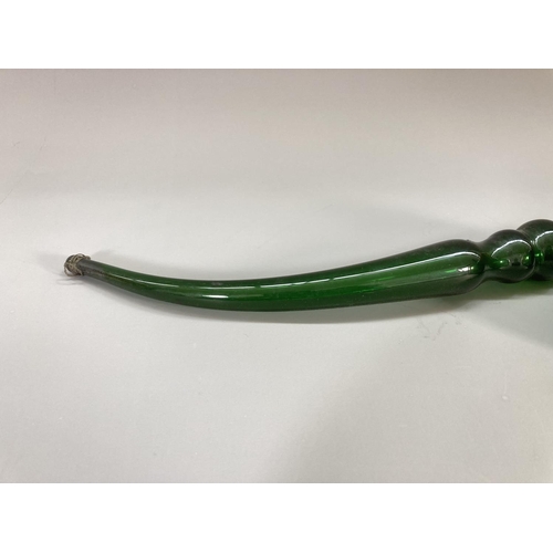 215 - A 19th century Nailsea style green glass pipe - approx. 36cm long