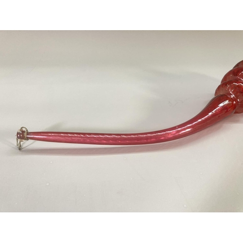 216 - A 19th century Nailsea style cranberry glass pipe - approx. 39cm long