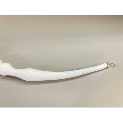 217 - A 19th century Nailsea style white glass pipe - approx. 35cm long