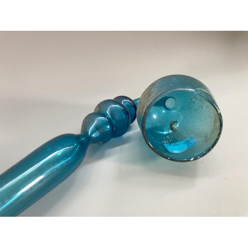 218 - A 19th century Nailsea style blue glass pipe - approx. 47cm long