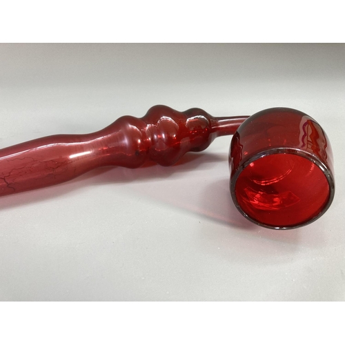 219 - A 19th century Nailsea style cranberry glass pipe - approx. 44cm long